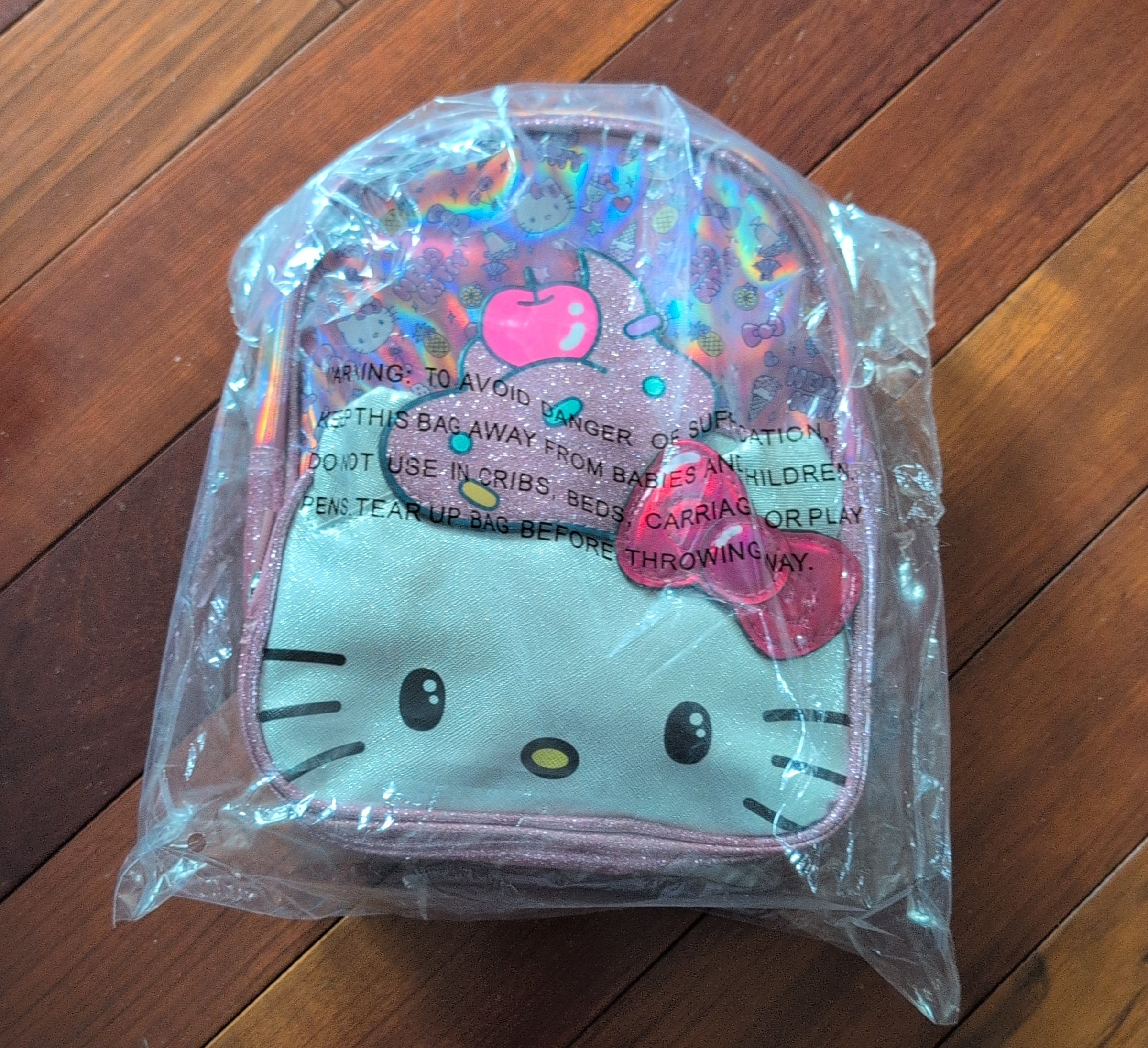 Hello Kitty Iridescent Glitter Mini Backpack – P&N Goods LLC